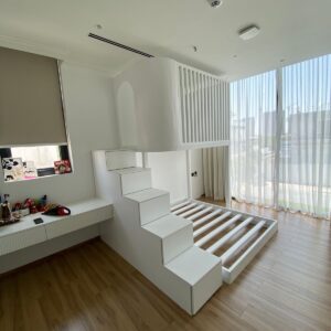 modern loft bed with storage staircase and elevated slatted cabin