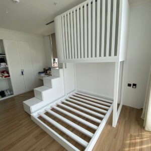 modern loft bed with storage staircase and elevated slatted cabin